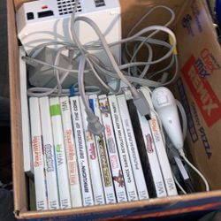 Nintendo Wii Bundle Lot System And 1 controller and 2 nunchucks 12 Games In Good Condition Everything Tested!!