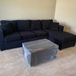 Black Sectional With Ottoman 