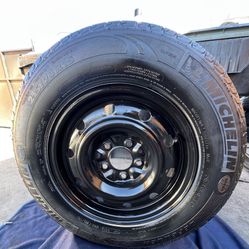 1 GOOD USED RIM & TIRE FOR SPARE 15X6 1/2  5X4.5 215/70R15 MICHELIN TIRE $35 PICKUP ONLY 