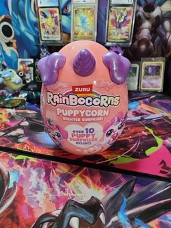ZURU Rainbocorns Puppycorn Scented Surprise toy in a pink

egg.