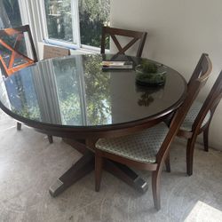 Table With Glass Top And Four Chairs