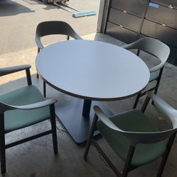 1 Table And 4 Chairs 