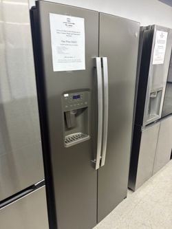 GE side by side refrigerator with ice and water