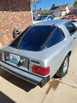 Mazda rx7.  1979  collector license plates.