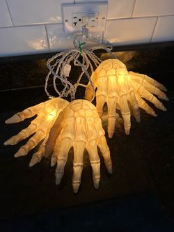 VINTAGE LIGHT UP SKELETON HANDS BLOW MOLD