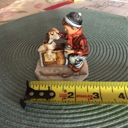 Norman Rockwell figurine a boy meets his dog