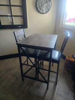 Table and chairs, 1st $60 takes it.