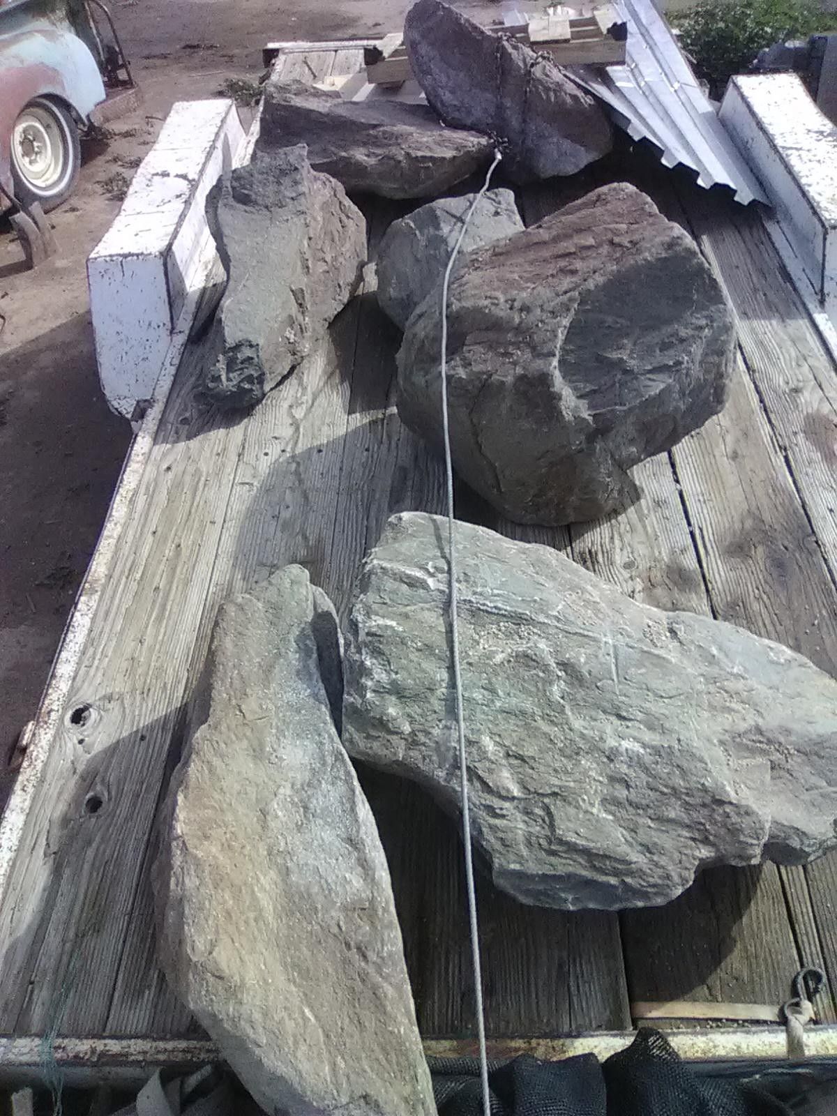 7 Green Granite Boulders $150 all