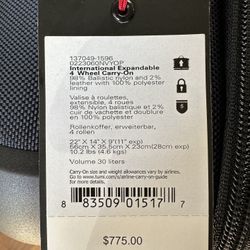 TUMI International Expandable 4 Wheel carry-On