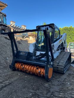 Skid steer mulching attachment