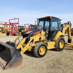 11" Caterpillar 420E-iT Backhoe Loader