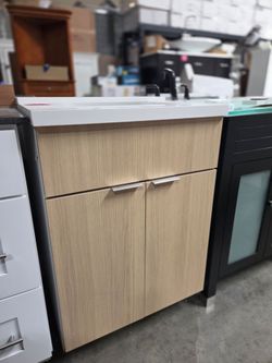 24-inch Light Wood Bathroom Vanity with White Sink Top
