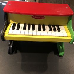 Melissa and Doug learn to play piano