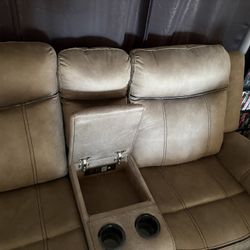 Brown/tan Reclining Love Seat