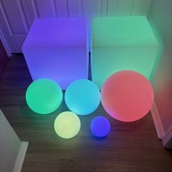 Loftek (2) lighted cubes and (5) floating ball lights 