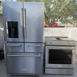KitchenAid by door, stainless steel fridge sliding stove, both work perfect in good condition. Free delivery to your garage.