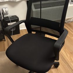 Office mesh chair with rollerblade wheels and cover