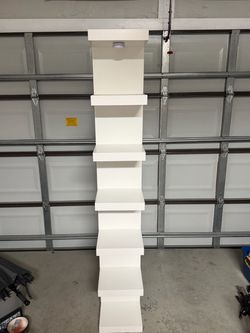 Wall shelf unit, 5 tier. Looks new
