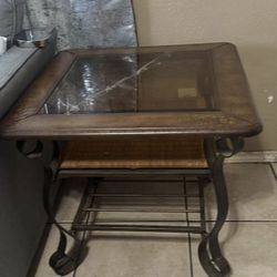 $ 140.      3 piece glass brown living room table set