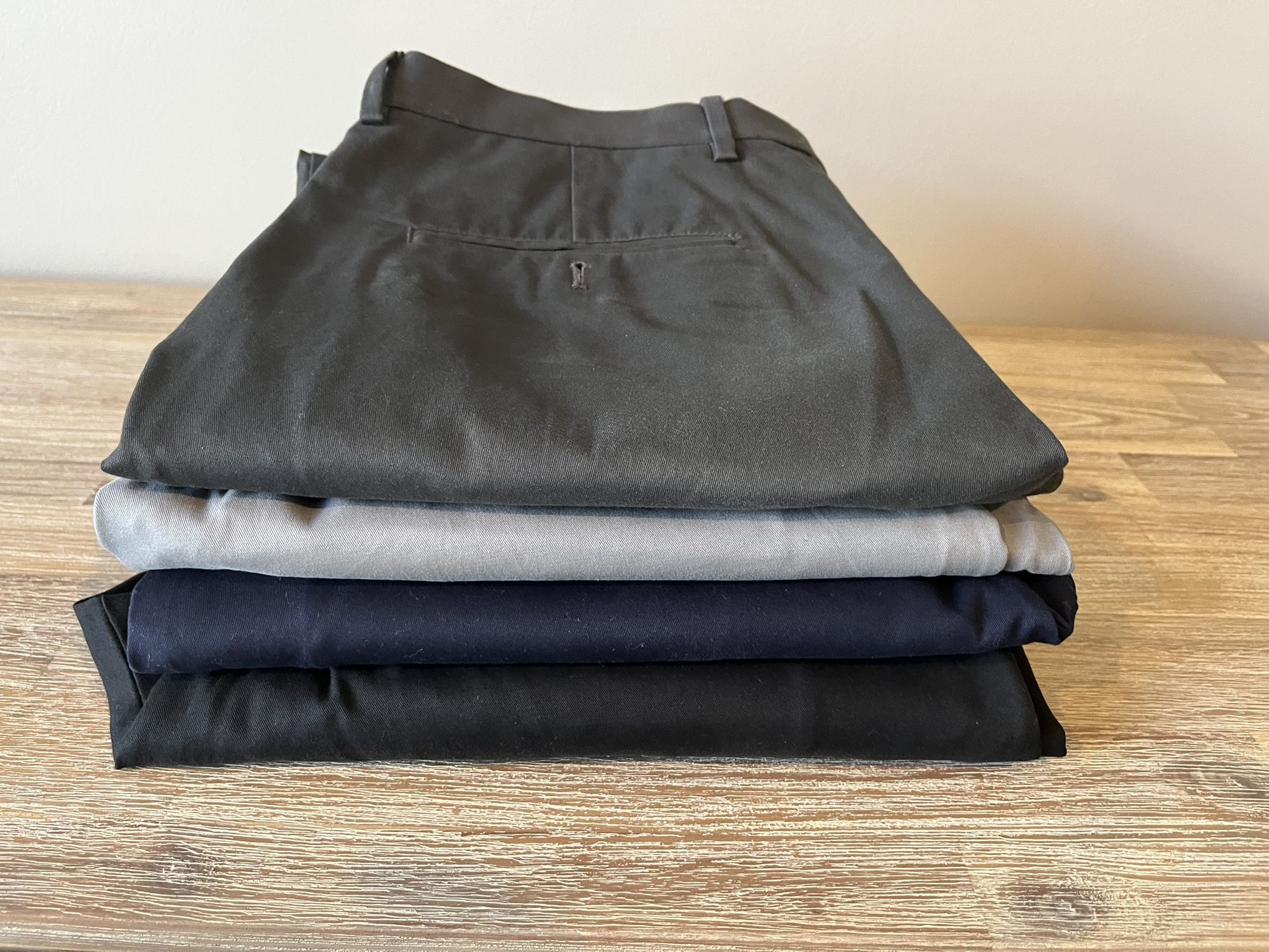 Express Photographer Dress Pants 30in x 30in Black, Navy Blue, Light Gray, Dark Grey, Black. 8 dollars each. All four for 35. Buy one or all.