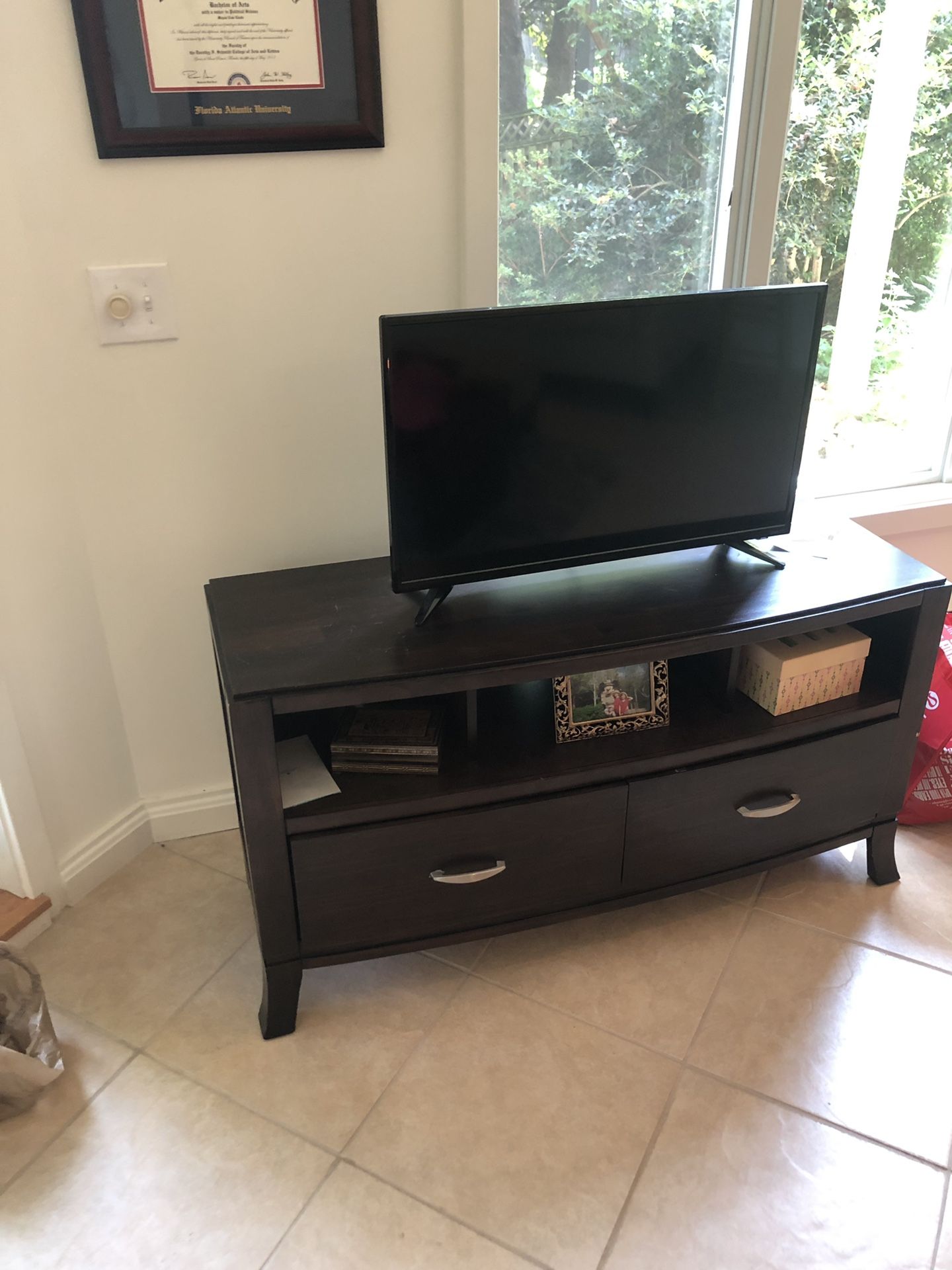 Dark mahogany wood entertainment center/ tv stand