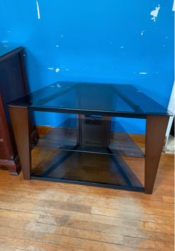 3-Tier Glass and Wood TV Stand great for corners too please check my other listings good condition