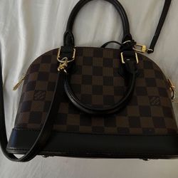 louis vuitton alma bag