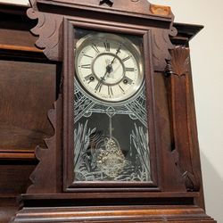 Late 1800s antique Waterbury clock. Nice face/dial and beautiful pendulum. Has gong chime and key. Movement appears as if it was serviced and cleaned,