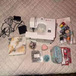 Singer M1000 Sewing Machine + Supplies (Threads, Scissors, Fabric)