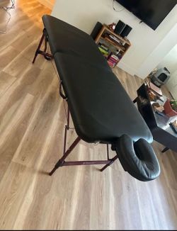 Massage table