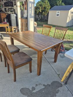 Heavy Wood Table And Chairs.
