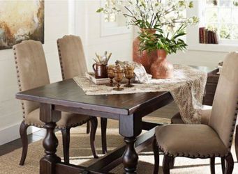 Dark Wood Dining Table with Upholstered Chairs