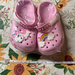Pink Crocs clogs with unicorn and rainbow design #kidcore #rainbow