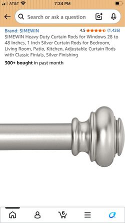 Two curtain rods 28-48”
