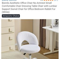 New small swivel chair w/lumbar support