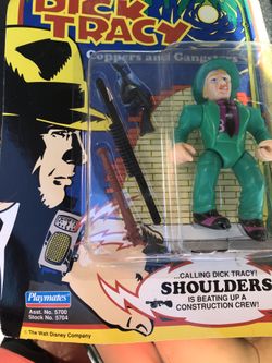 Shoulders of dick Tracy figurines