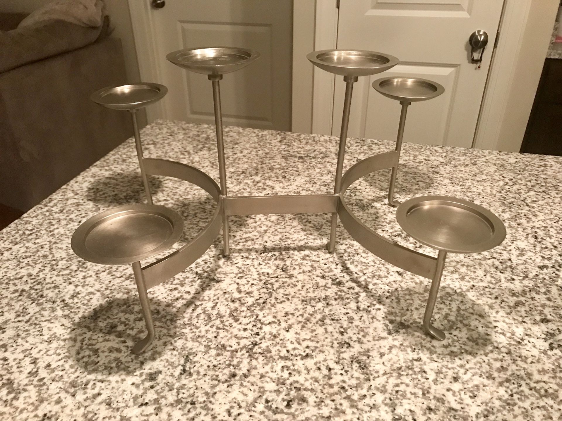Beautiful centerpiece candle holder!.. would look beautiful all lit up on your table for any special occasion!