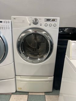 Lg electric dryer with pedestal ( delivery Available)
