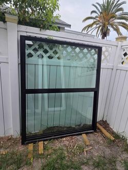Brand New 52W x 62H PGT Aluminum Window
