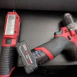 Milwaukee M12 Lithium Ion XC 4.0 Battery, Hammer Drill, And Flashlight