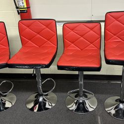 Set of 4 red  leather adjustable bar stools