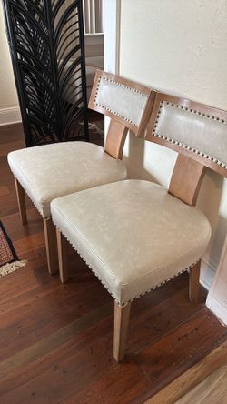 Two brand new leather chairs