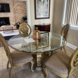 Glass dining table and 6 total chairs