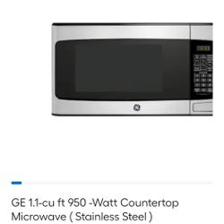 *open box - never used* GE 1.1 Cu. Ft. Capacity Countertop Microwave Oven (model GCST11N1WSS). 