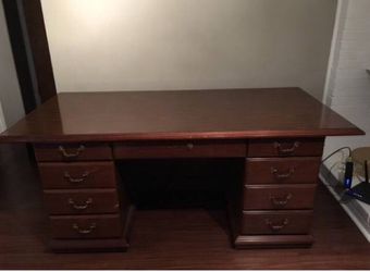 Solid wood desk with glass top