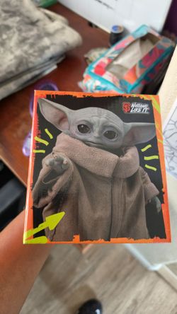 Grogu Bobblehead and Mandalorian Sweater