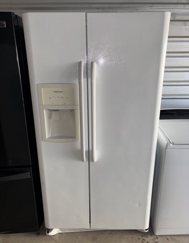 White Frigidaire Refrigerator And Freezer