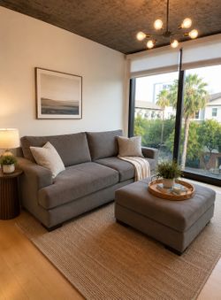 Living spaces couch and ottoman (delivery Available)