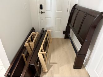 Full-size dark brown sleigh bed with storage