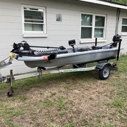 Ascend tournament 133x fishing kayak with Coleman outboard